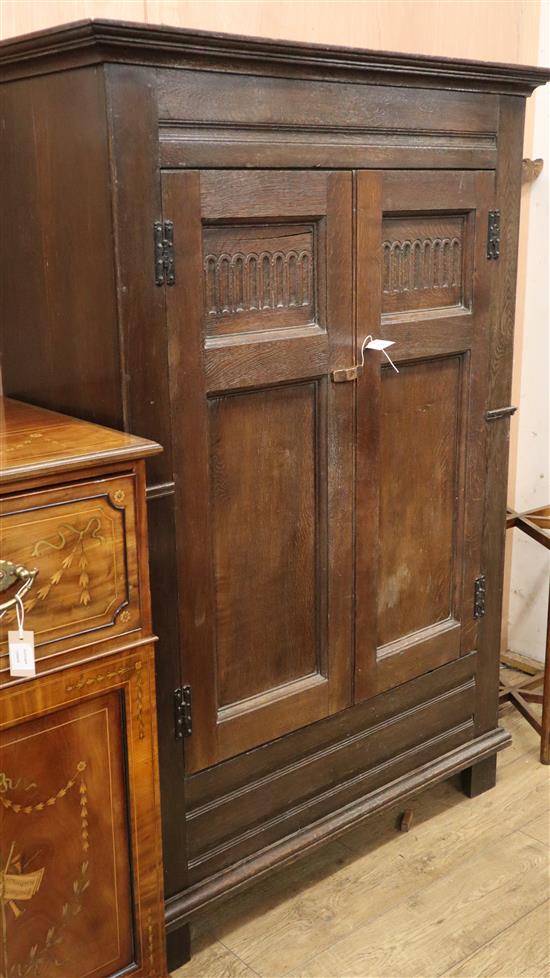 An oak hall cupboard, retailed by Gillows W.112cm